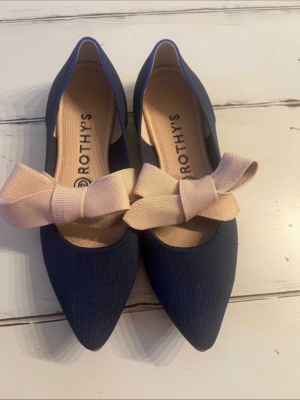 Rothy's Navy Pointed Flats with Blush Bow Accent